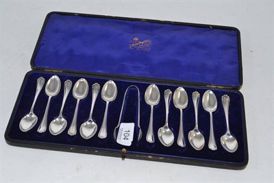Lot 104 - A set of twelve silver teaspoons and tongs, Sheffield 1905 in a fitted case