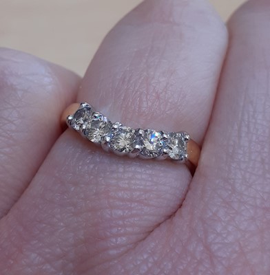 Lot 2054 - An 18 Carat Gold Diamond Five Stone Wishbone...