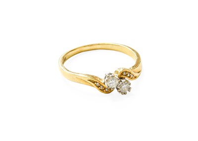 Lot 353 - An 18 Carat Gold Diamond Two Stone Twist Ring,...