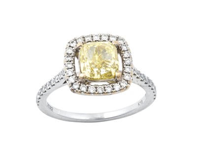 Lot 2249 - A Diamond Cluster Ring the fancy intense...