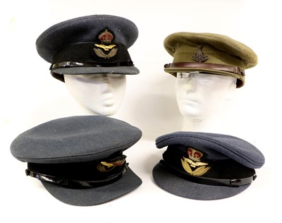Lot 160 - Two Second World War RAF Officer's Peaked Caps,...