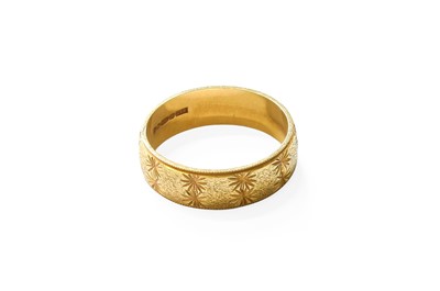 Lot 350 - An 18 Carat Gold Textured Band Ring, finger...