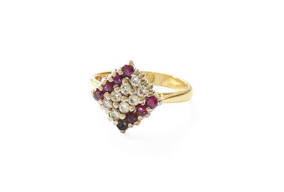 Lot 320 - An 18 Carat Gold Ruby and Diamond Cluster Ring,...