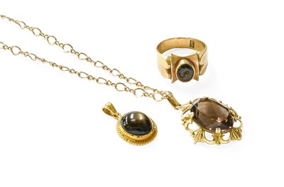 Lot 346 - A 9 Carat Gold Smoky Quartz Pendant on Chain,...