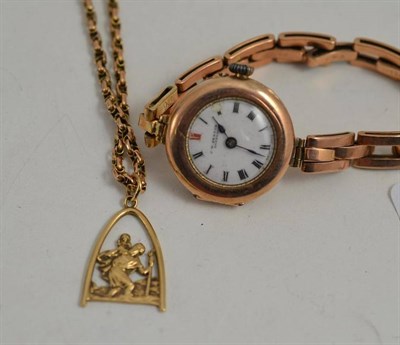Lot 131 - A 9ct gold chain with St Christopher and a gilt ladies watch (2)