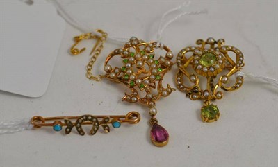 Lot 132 - Two pearl and green stone pendants and a turquoise bar brooch (3)
