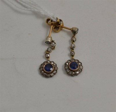Lot 138 - A pair of sapphire and diamond earrings