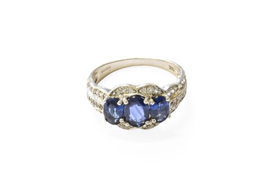 Lot 371 - A 14 Carat White Gold Sapphire and Diamond...