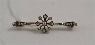 Lot 143 - A diamond set bar brooch