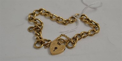 Lot 144 - A curb and lock bracelet