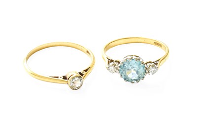 Lot 444 - A Blue Zircon and Diamond Three Stone Ring,...