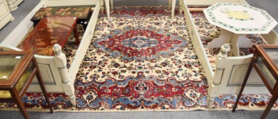 Lot 1032 - Mashad Carpet, the ivory ground centred by a...