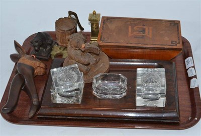 Lot 165 - A black forest carved nutcracker modelled as a hare, two bears, inkstand, padlock, etc
