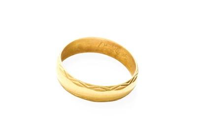 Lot 447 - An 18 Carat Gold Band Ring, finger size P