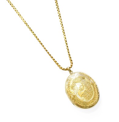 Lot 399 - An Engraved Locket on Chain, locket measures 4....