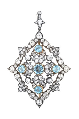 Lot 2307 - A Blue Topaz and Diamond Brooch/Pendant the...