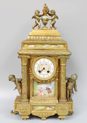 Lot 1421 - A Gilt Metal and Porcelain-Mounted Mantel...