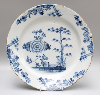 Lot 30 - An English Delft Charger, 18th century,...