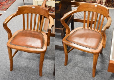 Lot 1187 - A Pair of Early 20th Century Oak Office Chairs,...