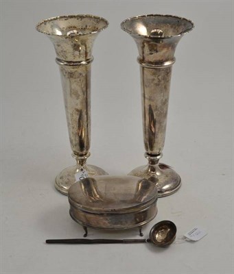 Lot 190 - A pair of silver loaded vases, a silver trinket box and a small Georgian toddy ladle (4)