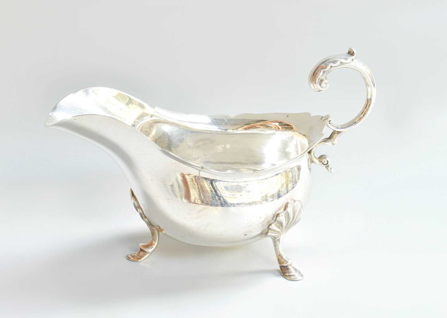 Lot 9 - An Edward VII Silver Sauceboat, by Walker and...