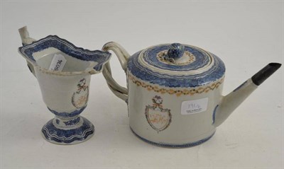 Lot 191 - An 18th century Chinese export teapot and milk jug, each with heraldic devices