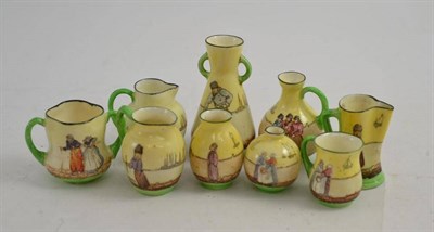 Lot 192 - Nine Royal Doulton miniature china ornaments decorated with Dutch scenes