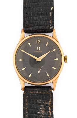 Lot 2357 - Omega: A 9 Carat Gold Hobnail Finished Black...