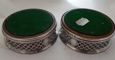 Lot 2018 - A Pair of George III Silver Wine-Coasters
