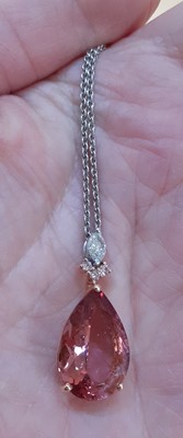 Lot 2271 - A Pink Tourmaline and Diamond Pendant on Chain...
