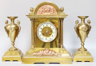 Lot 1423 - A French Brass Striking Mantel Clock Garniture,...