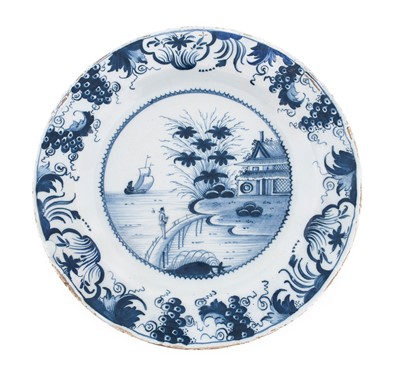 Lot 73 - An English Delft Plate, probably Liverpool or...