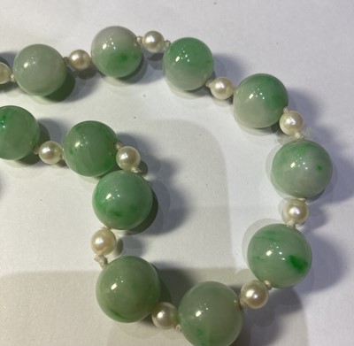 Lot 469 - A Jade Bead and Cultured Pearl Necklace,...