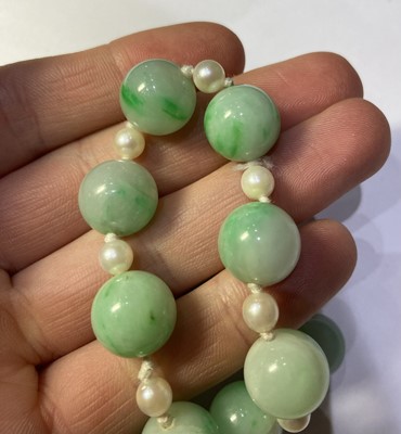 Lot 469 - A Jade Bead and Cultured Pearl Necklace,...