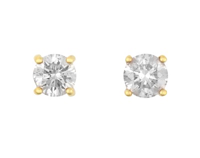 Lot 2242 - A Pair of Diamond Solitaire Earrings the round...