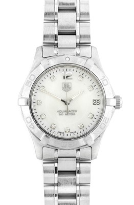 Lot 2432 - Tag Heuer: A Lady's Stainless Steel Calendar...