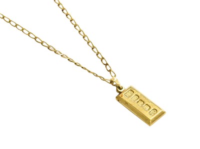 Lot 355 - A 9 Carat Gold Ingot on Chain, pendant length...