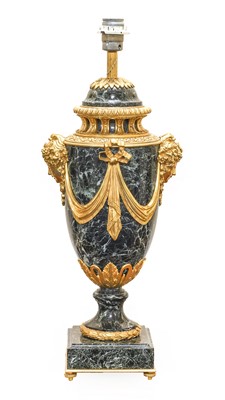 Lot 143 - A Gilt-Metal-Mounted Variegated Green Marble...
