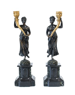 Lot 134 - A Pair of Gilt and Patinated Bronze Figural...