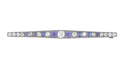 Lot 2326 - A Sapphire and Diamond Brooch graduated oval...