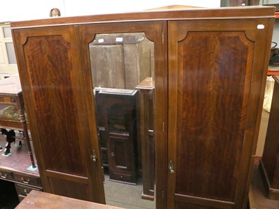 Lot 1320 - An Edwardian Mirror Fronted Triple Compactum...