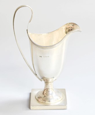 Lot 28 - A Pair of Silver pepperettes and a cream jug