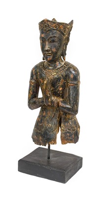 Lot 124 - A South East Asian Lacquered Carved Wood...