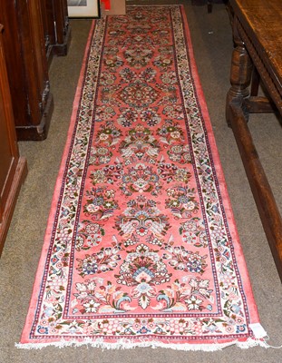 Lot 1036A - Narrow Saroukh Runner, the candy pink field of...