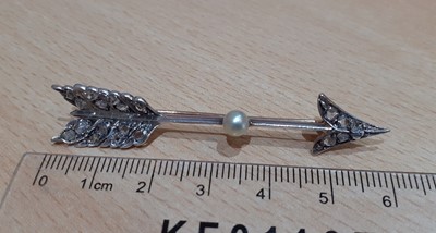 Lot 2103 - A Diamond and Pearl Arrow Brooch, circa 1900...