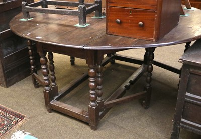 Lot 1385 - An 18th Century Oak Gateleg Dining Table, on...