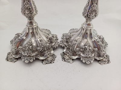 Lot 2231 - A Pair of Portuguese Silver Five-Light Candelabra