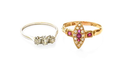 Lot 441 - A Ruby and Diamond Ring, the navette cluster...