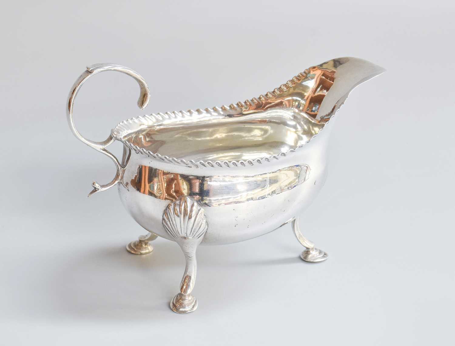 Lot 3 - A George III Silver Cream or Sauceboat, by...