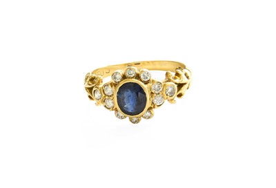 Lot 389 - An 18 Carat Gold Sapphire and Diamond Cluster...